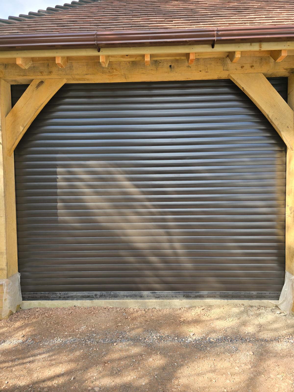 Roller Door Retro Fit Into Oak Framed Building