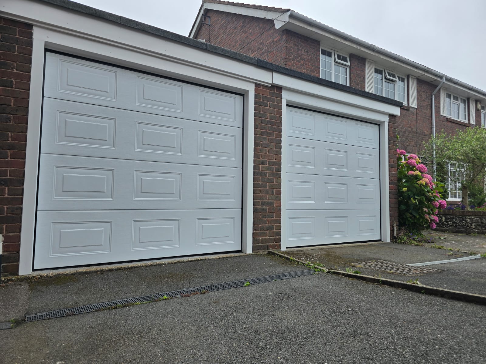 Twin Sectional Georgian Doors Automatic And Upvc Trim To Finish